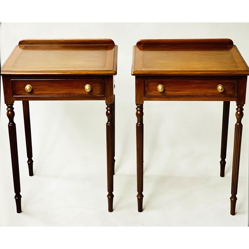 601 - LAMP/SIDE TABLES, a pair, George III design, walnut cross banded each with frieze drawer and reeded ... 