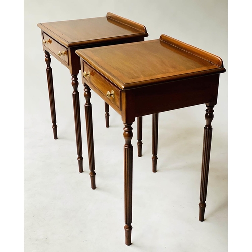 601 - LAMP/SIDE TABLES, a pair, George III design, walnut cross banded each with frieze drawer and reeded ... 