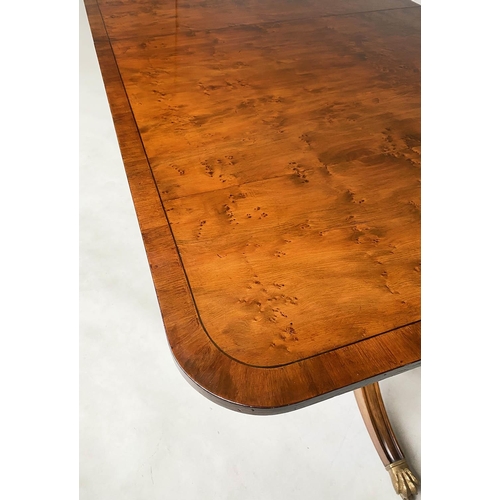 603 - EXTENDING DINING TABLE, George III design, yew wood raised upon twin pillar outswept supports with t... 