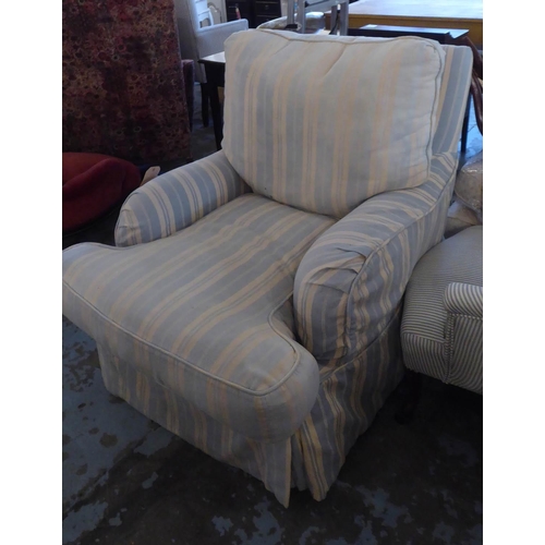 38 - HOWARD STYLE ARMCHAIR, striped loose fabric cover with two scatter cushions, 82cm W.