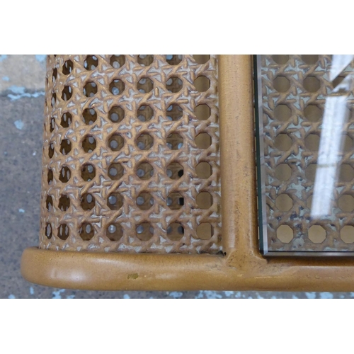 176 - LOW TABLE, 1960's Danish style, faux rattan with glass top, 120cm x 50cm x 45cm.