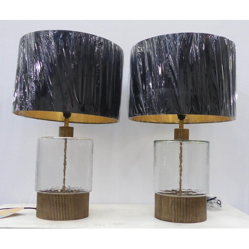 61 - TABLE LAMPS, a pair, 1970's Italian style with shades, 72cm H. (2)