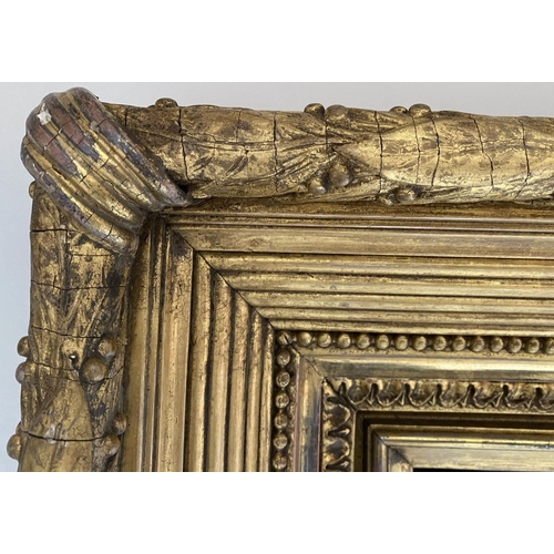 581 - WALL MIRROR, 19th century giltwood and gilt composition with trailing leaf berry frame, crossed ribb... 