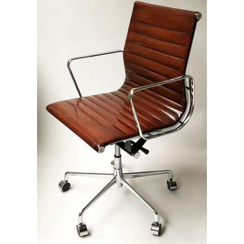 618 - AFTER CHARLES AND RAY EAMES ALUMINIUM GROUP STYLE DESK CHAIR, with hand finished mid brown leather.