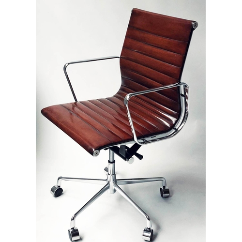 618 - AFTER CHARLES AND RAY EAMES ALUMINIUM GROUP STYLE DESK CHAIR, with hand finished mid brown leather.