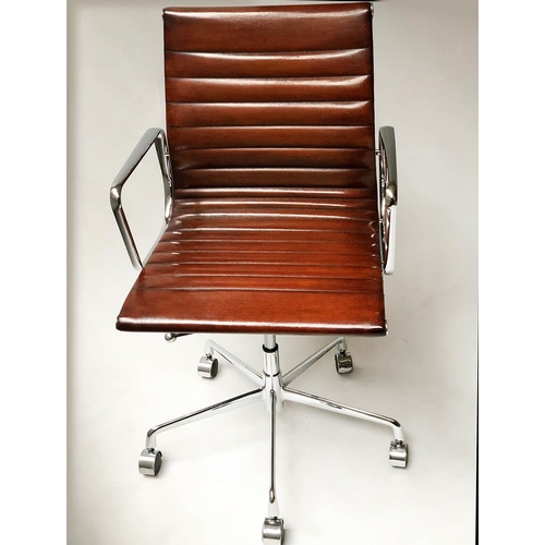 618 - AFTER CHARLES AND RAY EAMES ALUMINIUM GROUP STYLE DESK CHAIR, with hand finished mid brown leather.