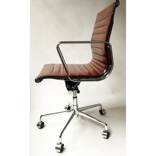 618 - AFTER CHARLES AND RAY EAMES ALUMINIUM GROUP STYLE DESK CHAIR, with hand finished mid brown leather.