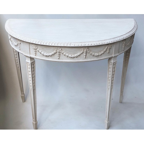 598 - CONSOLE TABLES, a pair, George III design, Robert Adam style demi lune grey painted with ribbon swag... 