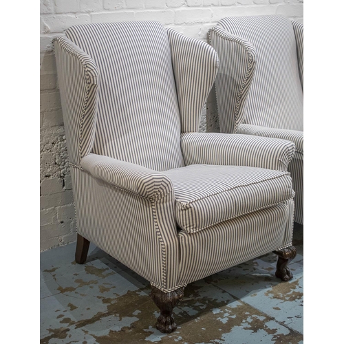 584 - WING ARMCHAIRS, a pair, Georgian style in ticking with cushion seats and hairy paw feet, 99cm H x 81... 