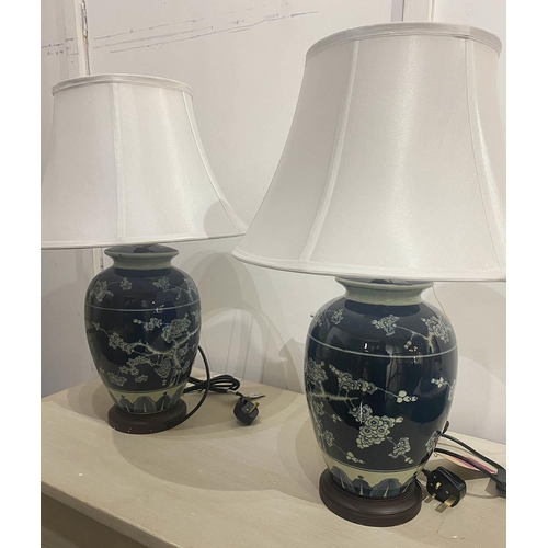 590 - CHINESE EXPORT STYLE TABLE LAMPS, a pair, with shades, 61cm H. (2)