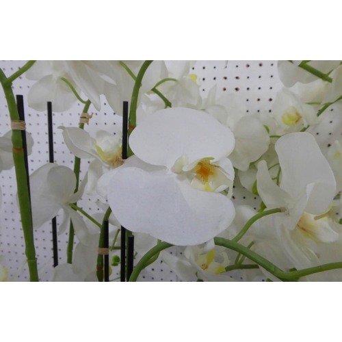 60 - FAUX ORCHIDS, a set of two, in hammered metal containers, each approx 115cm H.