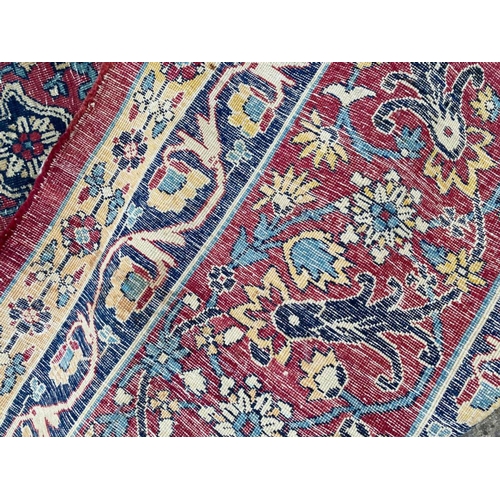 313 - ANTIQUE PERSIAN KIRMAN LAVER CARPET, 375cm x 270cm.