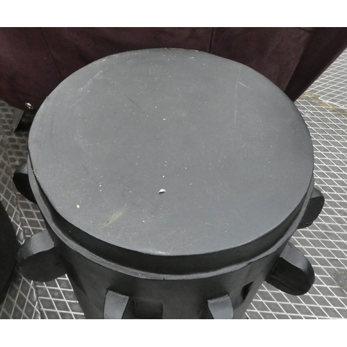 4 - DRUM TABLES, a graduated pair, ebonised finish, 57cm H x 52cm diam.