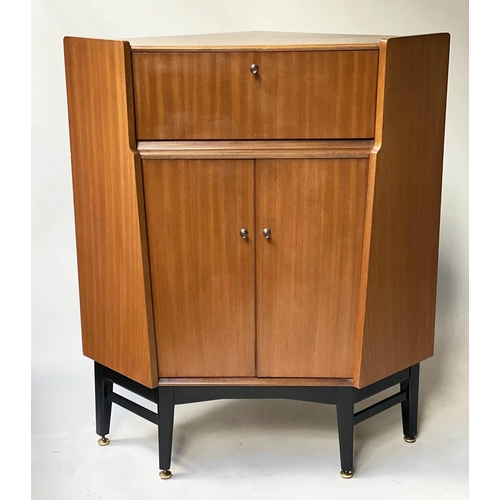52 - 'NATHAN' SECRETAIRE CORNER CABINET, 1970's, Sepeli with fitted fall front two doors and ebonised sup... 