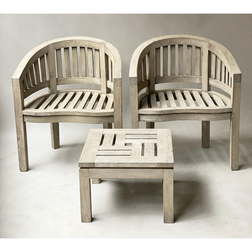 627 - 'BANANA' GARDEN ARMCHAIRS, a pair, weathered teak each with bow back together with a 'Lister' low ta... 