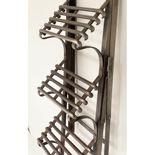 72 - FOLDING STEPS, formed iron slatted four tread and folding, 88cm H x 42cm x 107cm.