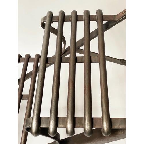 72 - FOLDING STEPS, formed iron slatted four tread and folding, 88cm H x 42cm x 107cm.