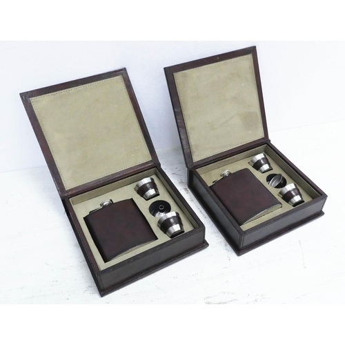 136 - HIP FLASK SETS, a pair, both in tan leathered boxes, 19cm x 19.5cm x 6cm. (2)