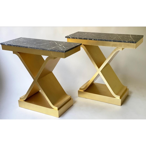 166 - CONSOLE TABLES, a pair, 88cm x 35cm D x 81cm H, bespoke gold leaf decorated X frames with black and ... 