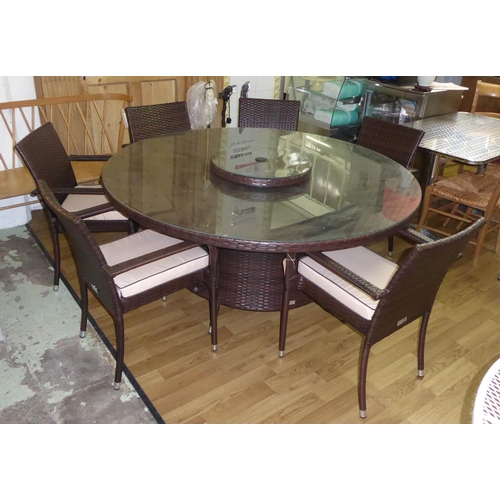 125 - RATTAN DIRECT GARDEN TABLE AND CHAIRS, 160cm diam. x 72cm H with a lazy Susan, a circular glass top ... 