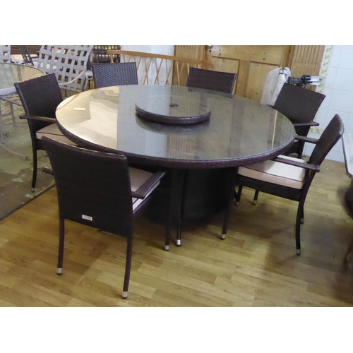 125 - RATTAN DIRECT GARDEN TABLE AND CHAIRS, 160cm diam. x 72cm H with a lazy Susan, a circular glass top ... 