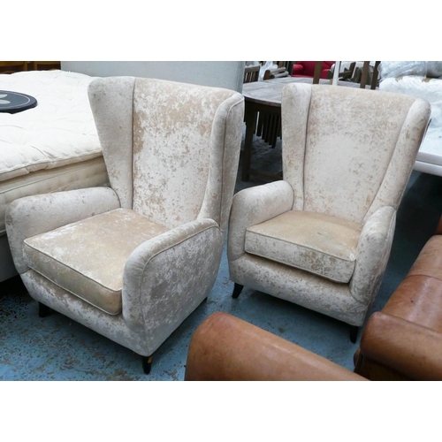 132 - ARMCHAIRS, a pair, 70cm W x 102cm H, in crushed champagne velvet. (2)