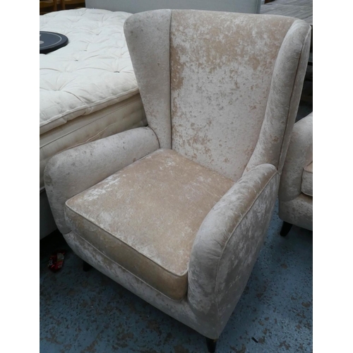 132 - ARMCHAIRS, a pair, 70cm W x 102cm H, in crushed champagne velvet. (2)