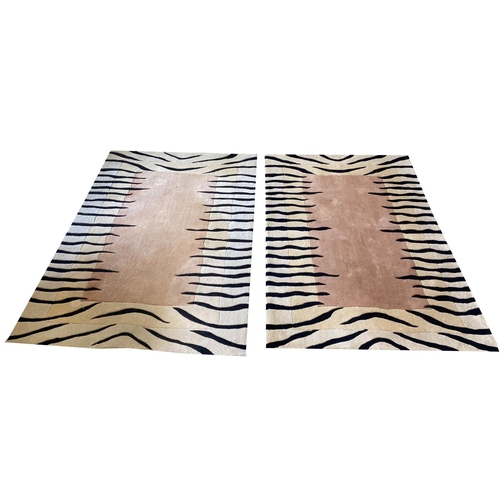 144 - CONTEMPORARY TIGER DESIGN RUGS, a pair, 183 x 122 cm each (2).