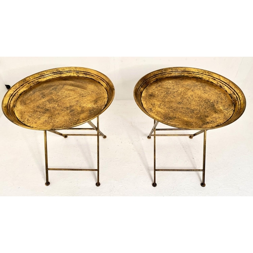 158 - SIDE TABLES, a pair, 66cm H x 66cm diam., aged gilt metal finish (2).