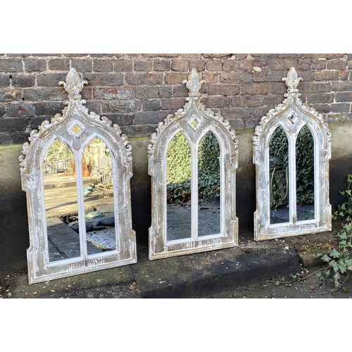 180 - ARCHITECTURAL WALL MIRRORS, a set of three, 116 x 60cm, Gothic Revival style, distressed painted fin... 