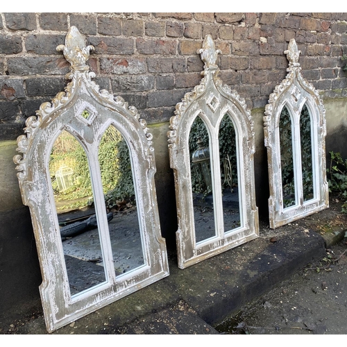 180 - ARCHITECTURAL WALL MIRRORS, a set of three, 116 x 60cm, Gothic Revival style, distressed painted fin... 