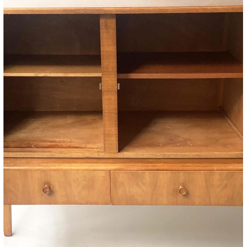 42 - MANNER OF A. COX SIDEBOARD, 1970's figured walnut  with three drawers and three doors with tall supp... 