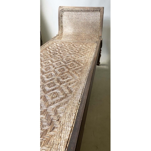 630 - ANGLO INDIAN DAYBED/CHAISE, late 19th/early 20th century North Indian teak and cane panelled with qu... 