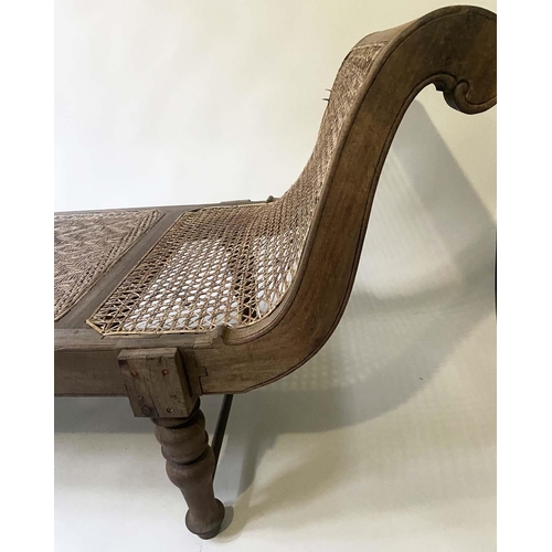 630 - ANGLO INDIAN DAYBED/CHAISE, late 19th/early 20th century North Indian teak and cane panelled with qu... 