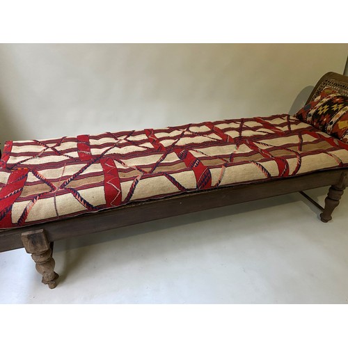 630 - ANGLO INDIAN DAYBED/CHAISE, late 19th/early 20th century North Indian teak and cane panelled with qu... 