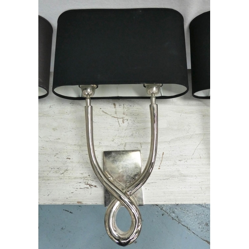 174 - COACH HOUSE WALL SCONCES, three, bases each 50cm H x 25cm W, polished metal with black shades. (3)