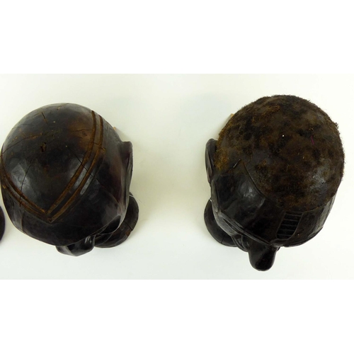 373 - THREE MAKONDE HEADS, Angola, carved wood, 27cm H x 15cm. (3)