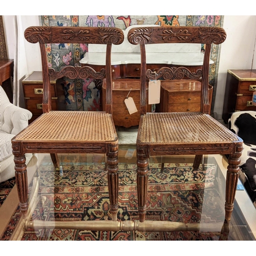 494 - SIDE CHAIRS, a pair, each 47cm W x 88cm H, George IV simulated rosewood with caned seats. (2)