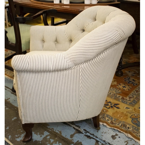 446 - ARMCHAIR, 79cm H x 77cm ticking upholstered with cushion seat and rear brass castors.