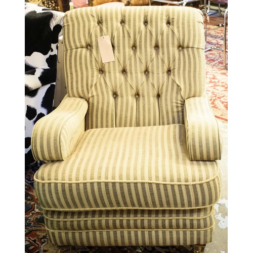 498 - ARMCHAIR, 93cm H x 80cm W x 105cm D, striped upholstery with cushion seat and brass front castors.