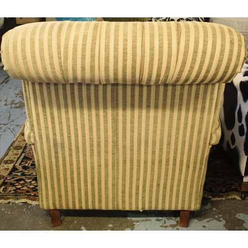 498 - ARMCHAIR, 93cm H x 80cm W x 105cm D, striped upholstery with cushion seat and brass front castors.