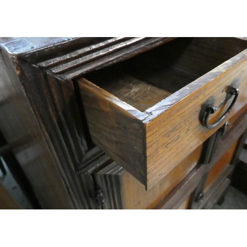 496 - KOREAN CABINET. 69cm W x 102cm x 34cm, 19th century elm, with three drawers and four doors.