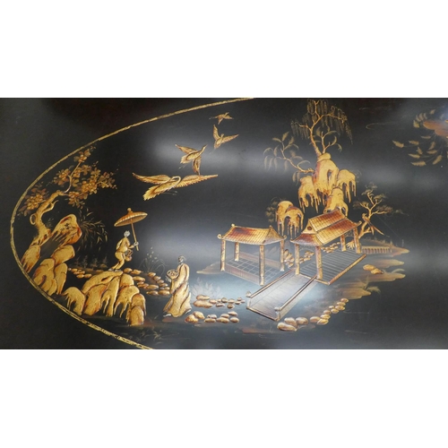 43 - LOW TABLE, 90cm x 48cm H x 178cm, black with gilt Chinoiserie detail.