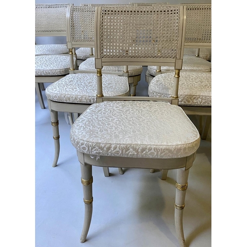 518 - DINING CHAIRS, a set of twelve, Regency style grey painted and parcel gilt with cane seats and ivory... 