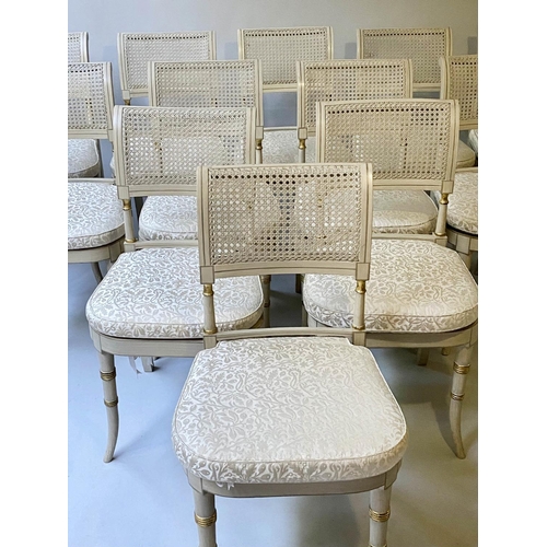 518 - DINING CHAIRS, a set of twelve, Regency style grey painted and parcel gilt with cane seats and ivory... 