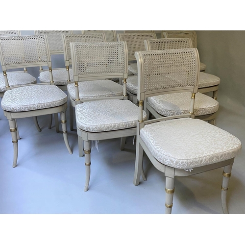 518 - DINING CHAIRS, a set of twelve, Regency style grey painted and parcel gilt with cane seats and ivory... 