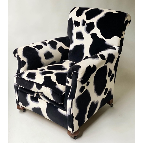 520 - ARMCHAIR, Howard style black and white printed velvet with scroll arms and bun front supports, 86cm ... 