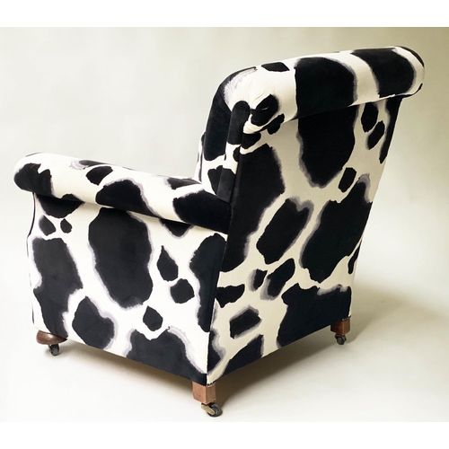 520 - ARMCHAIR, Howard style black and white printed velvet with scroll arms and bun front supports, 86cm ... 