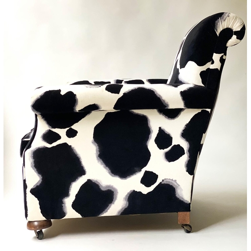 520 - ARMCHAIR, Howard style black and white printed velvet with scroll arms and bun front supports, 86cm ... 