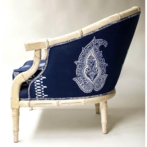 521 - FAUX BAMBOO ARMCHAIRS, a pair, batik royal blue cotton/linen upholstered, 68cm W. (2)